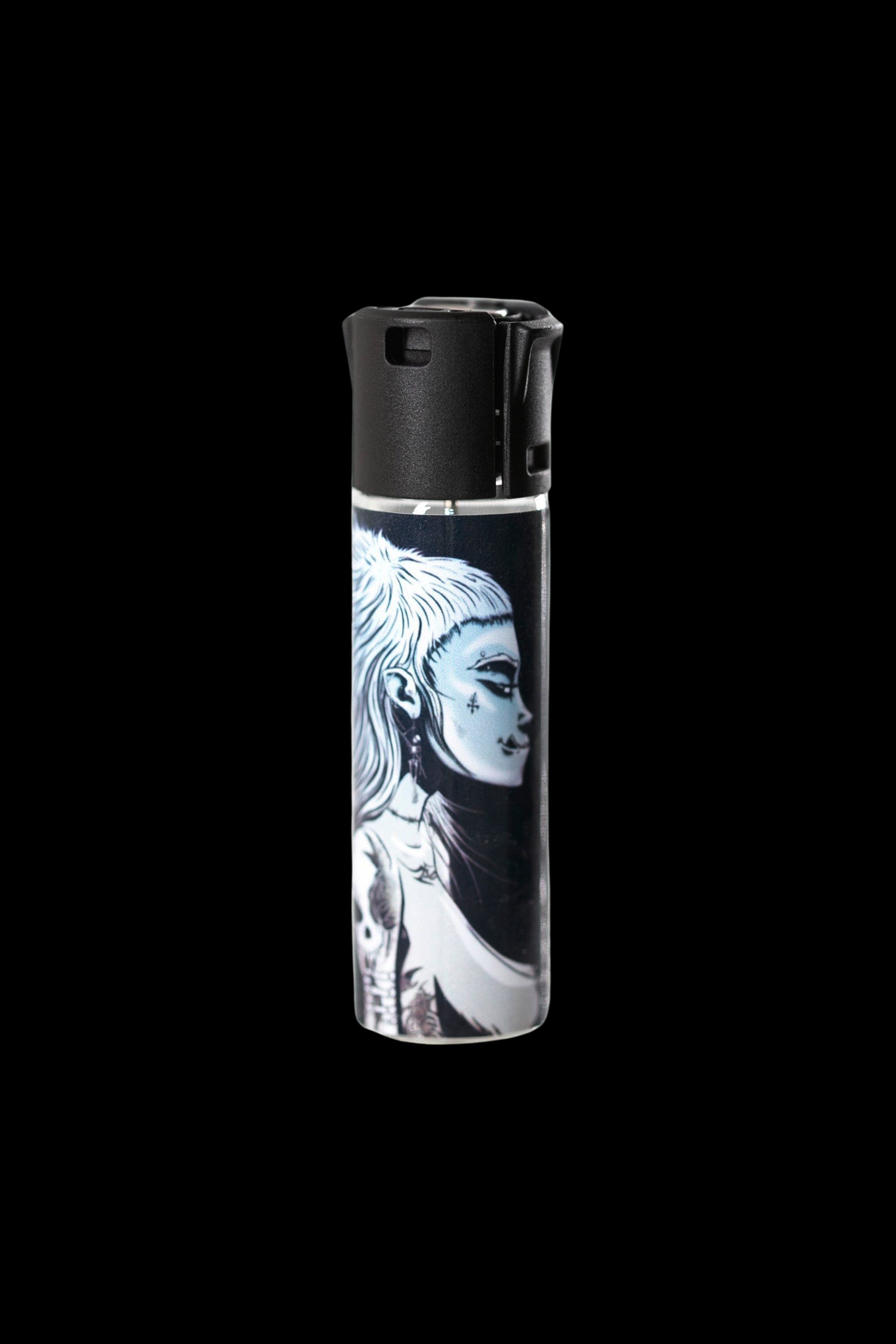 Clear lighter with illustrated woman’s face, black background.