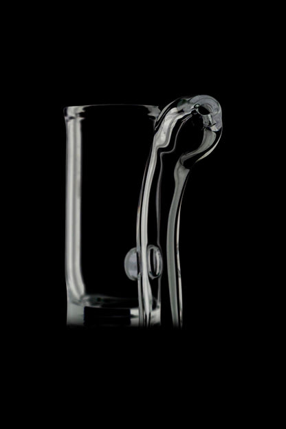 Clear glass cannabis water pipe against a black background.