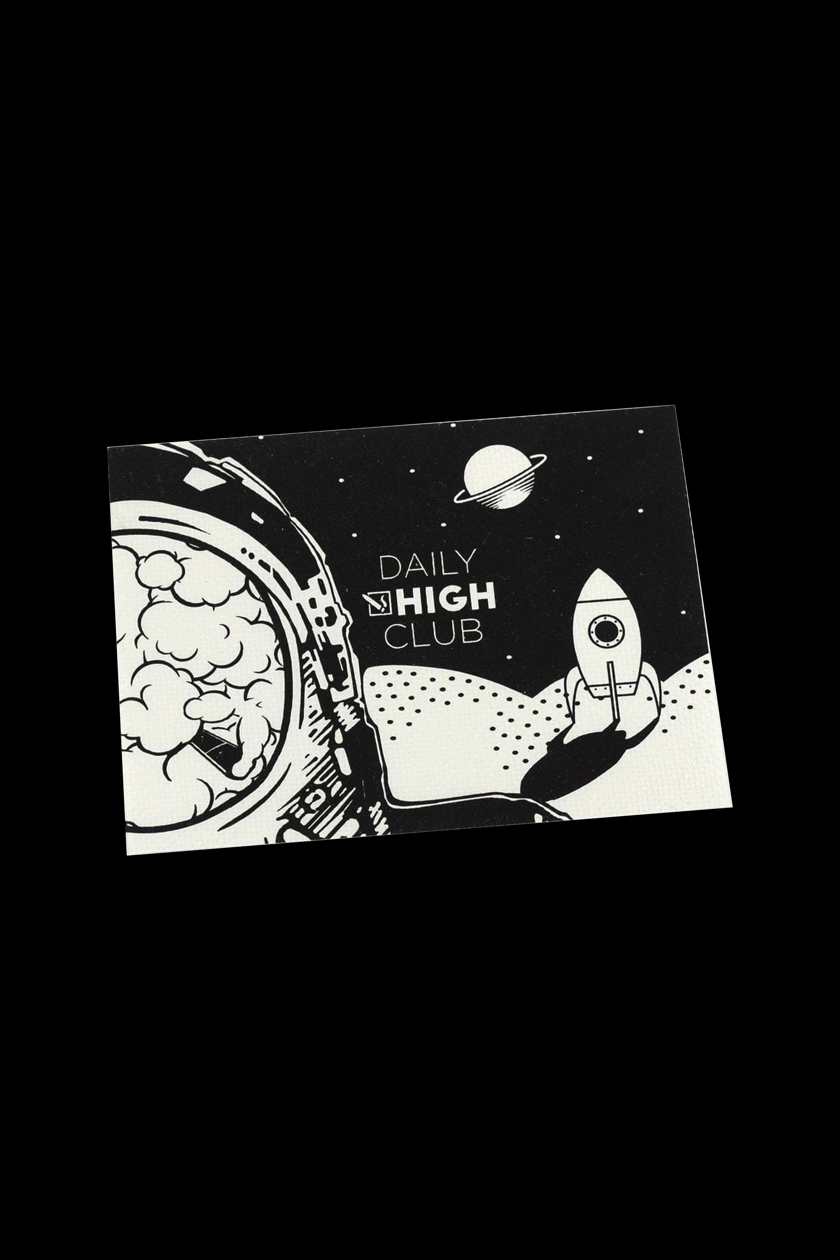 A white square sticker with a black and white illustration of an astronaut's helmet with a brain inside, a rocket ship on a moon landscape, and the text “DAILY HIGH CLUB.”