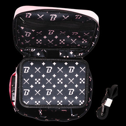 Top-down view of the open Blazy Susan Stash Bag showing patterned black-and-pink interior panels and a detachable black strap.
