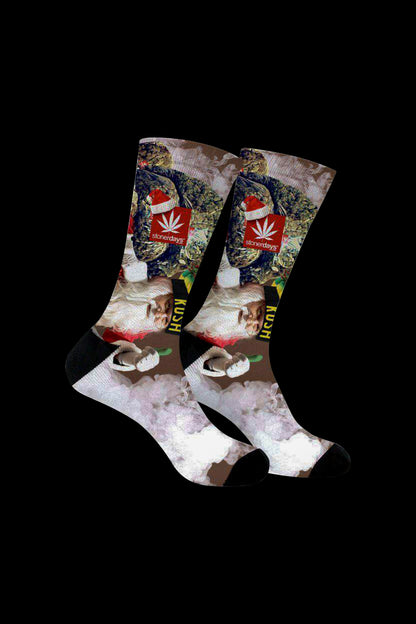 Kush-themed crew socks with cannabis leaf branding and patterned design.
