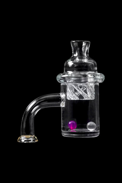 Close-up of a clear glass joint piece showing two small pearls, labeled The Stash Shack Ruby Terp Pearls, against a black background.
