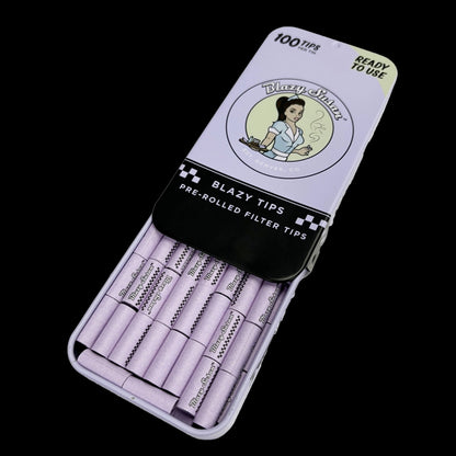 Angled close-up of a purple tin of Blazy Susan Pre Rolled Filter Tips Tin - 100ct - Display Box showing neatly aligned lavender tips.