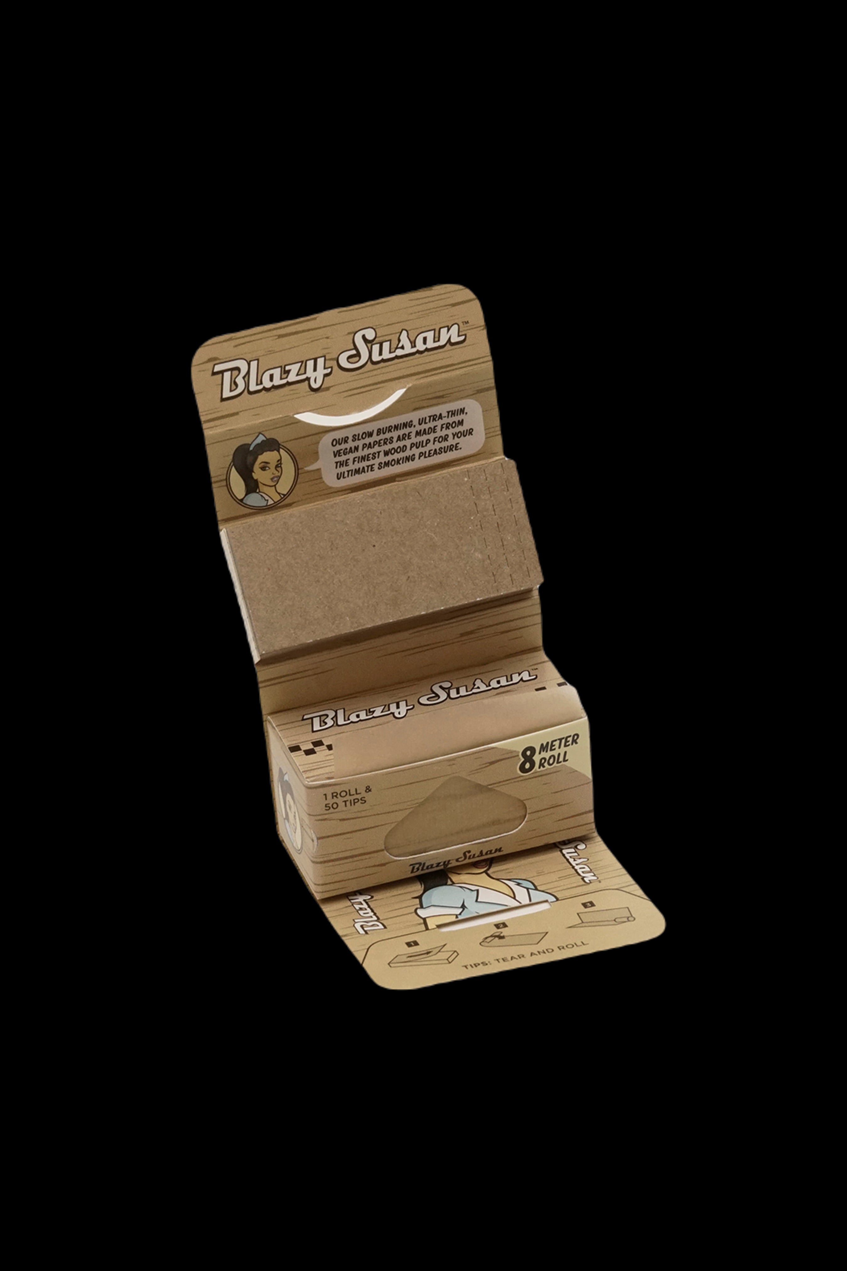 A package of "Blazy Susan" ultra-thin, 8-meter hemp rolling papers and 50 tips, featuring a cartoon woman with a bandana.