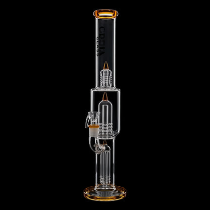 Vertical studio shot of the Croia Glass 16" Triple Rocket-Perc Scientific Glass Bong | Croia Glass, showing clear glass chambers, amber-rimmed mouthpiece and base, and internal percolators against a black background