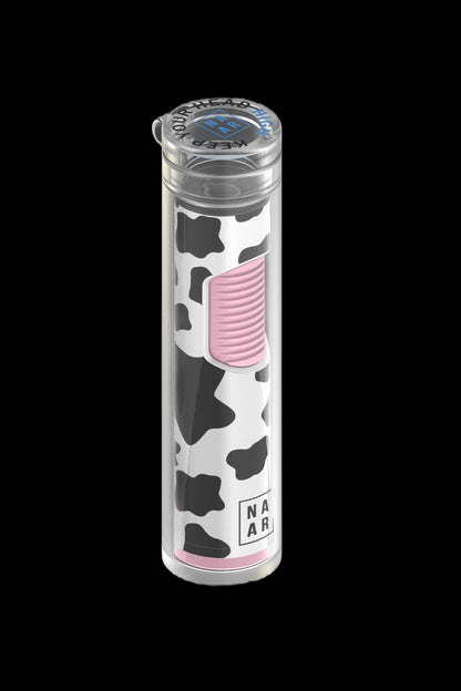 Cow-print cannabis pre-roll tube with a pink pre-roll inside.