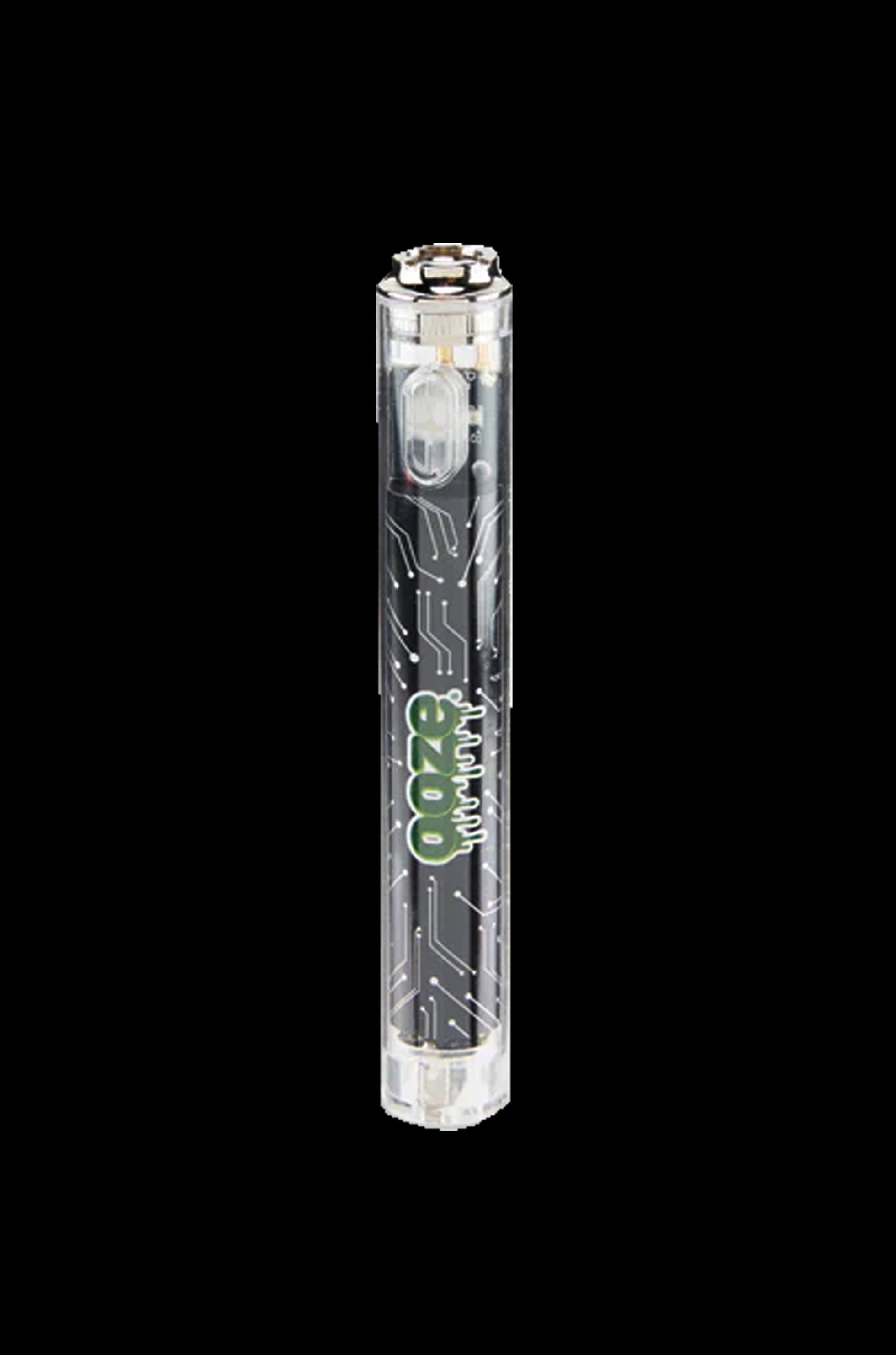Clear glass cannabis oil rig with green graphic detailing.