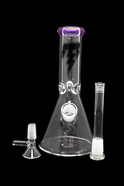 Glass bong with detachable downstem and bowl, isolated on a black background.