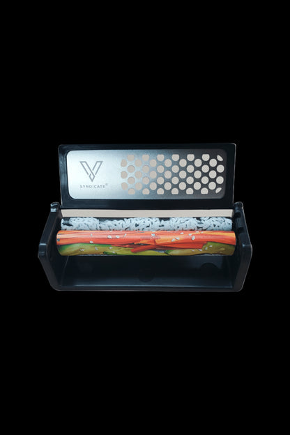 Black rolling machine with colorful cannabis visible inside, branded with a silver “Syndicate” logo.