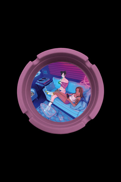 Round cannabis container featuring anime-style illustration of two women relaxing on a couch with a record player, bathed in neon blue and pink light.
