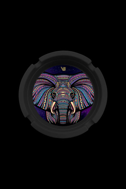A circular, black cannabis accessory case featuring a vibrant, psychedelic elephant head design composed of intricate geometric patterns in blues, pinks, and purples.