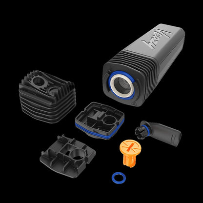 Angled close-up of disassembled black Storz & Bickel Veazy Vaporizer parts on a black background, showing blue and orange seals.