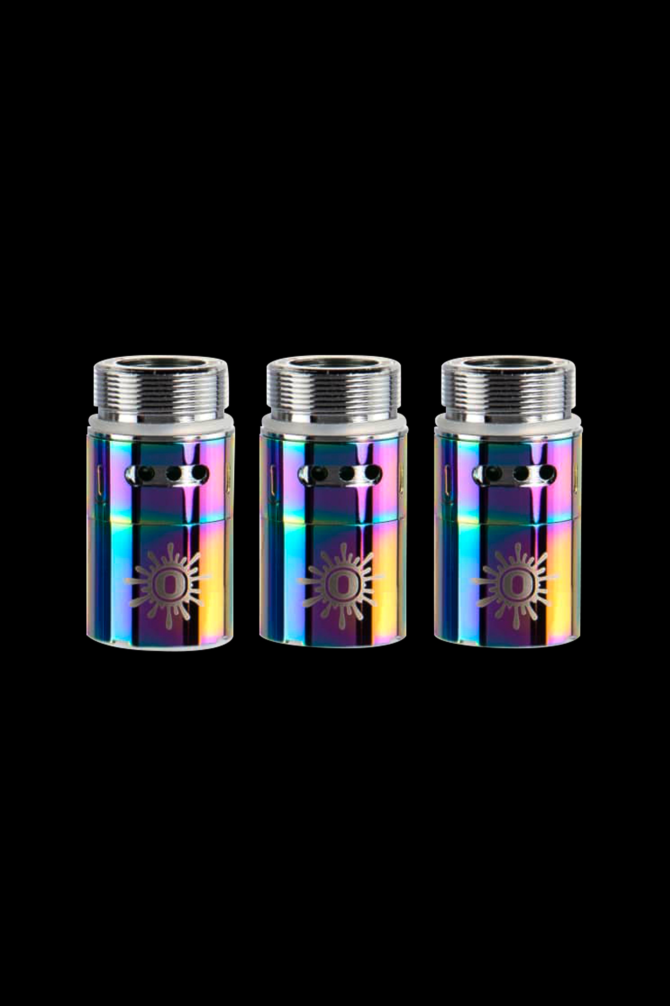 Three iridescent cannabis oil cartridges with a sunburst design against a black background.