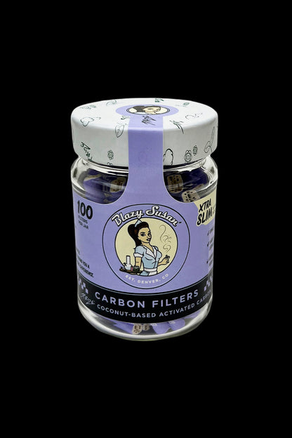 Jar of "Blazy Susan" carbon filters for cannabis smoking, with colorful label and 100 filters per jar.