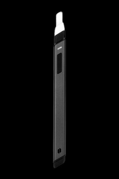 A side view of the Puffco Hot Knife, a black handheld device with a metallic tip, against a dark background.