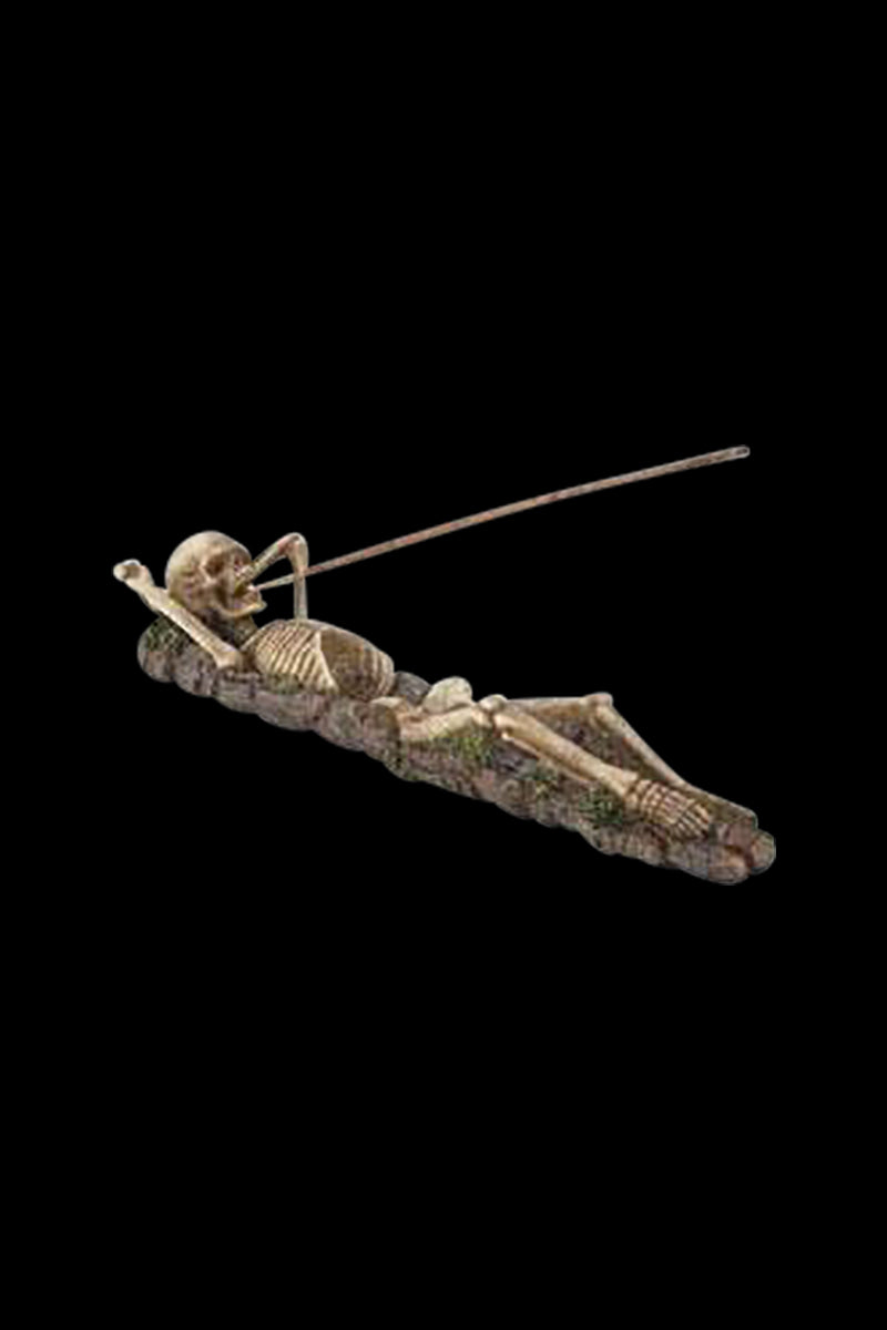 The Incense Burner - Skeleton is shown in a side view, depicting a detailed, bone-like sculpture designed for burning incense.