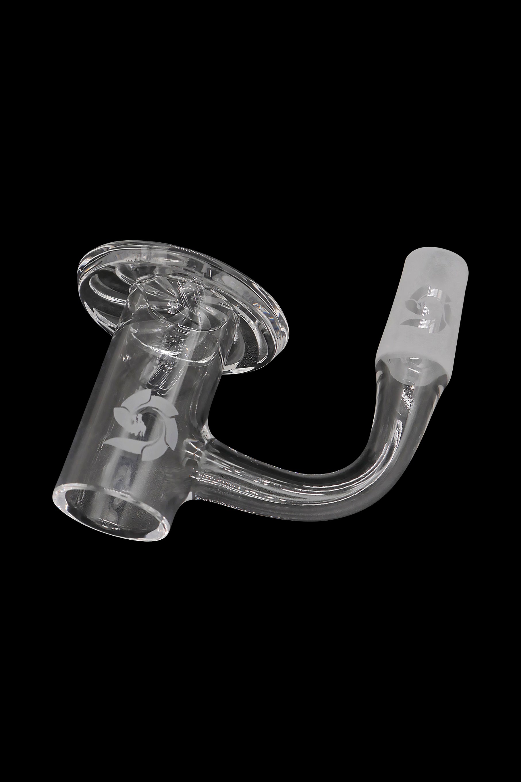 Clear glass cannabis oil rig attachment on a black background.