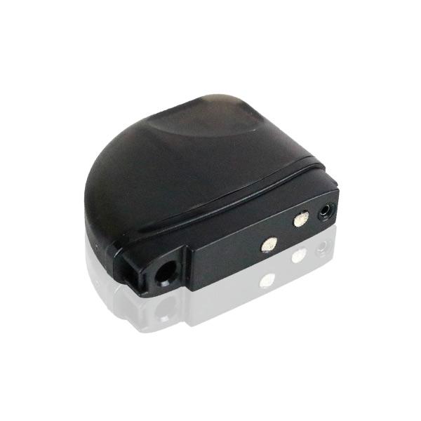 A diagonal view of the compact Kandy Pens Feather Vaporizer, shown in black with a sleek, minimalist design and a reflective surface.