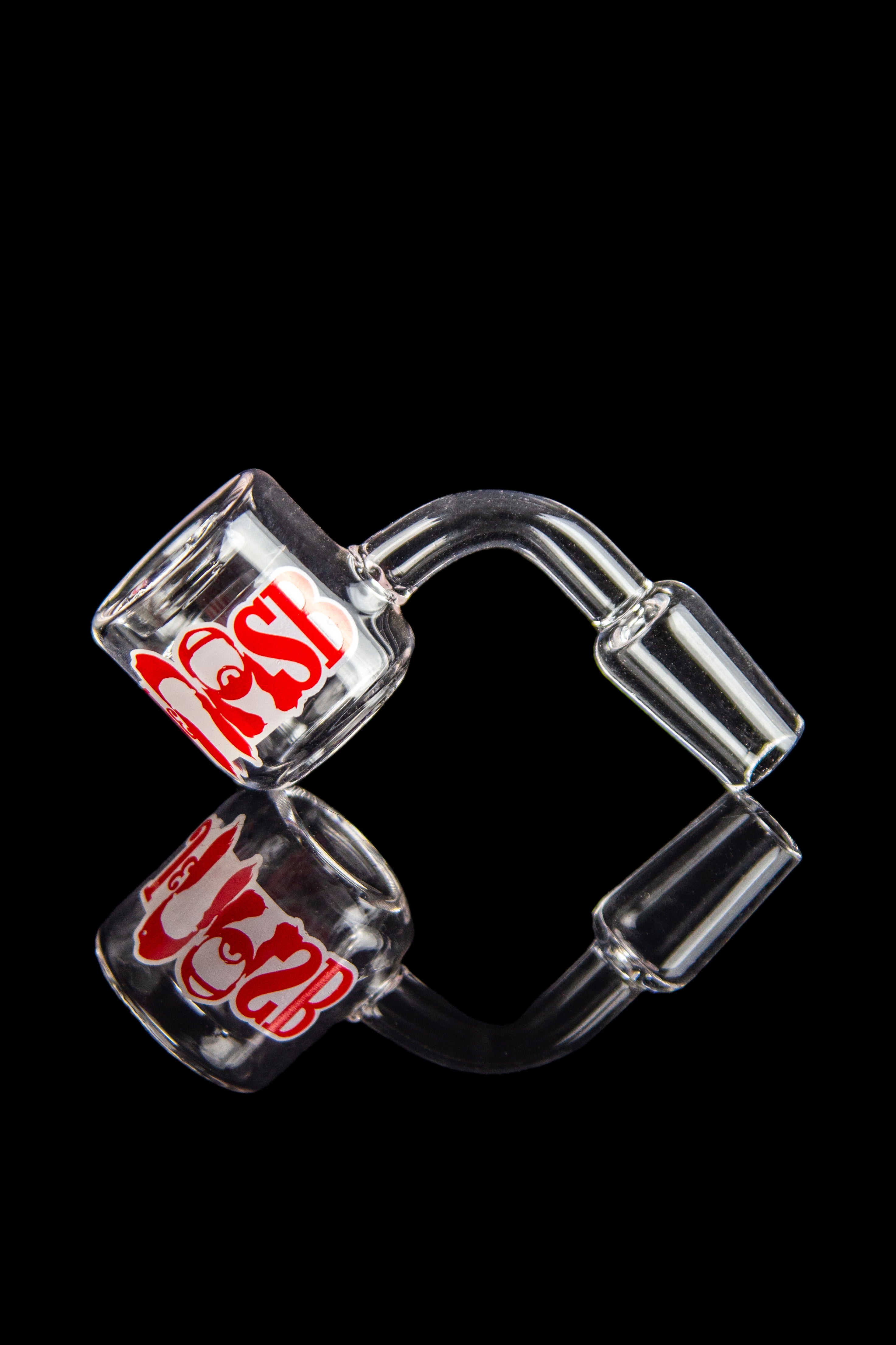 Clear glass bubbler with red lettering, isolated on a black background.