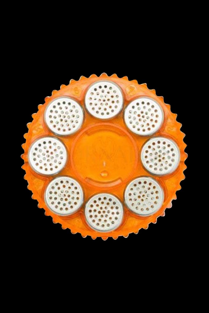 Overhead view of the Storz & Bickel Magazine with 8 dosing capsules, displaying a circular arrangement of capsule slots.