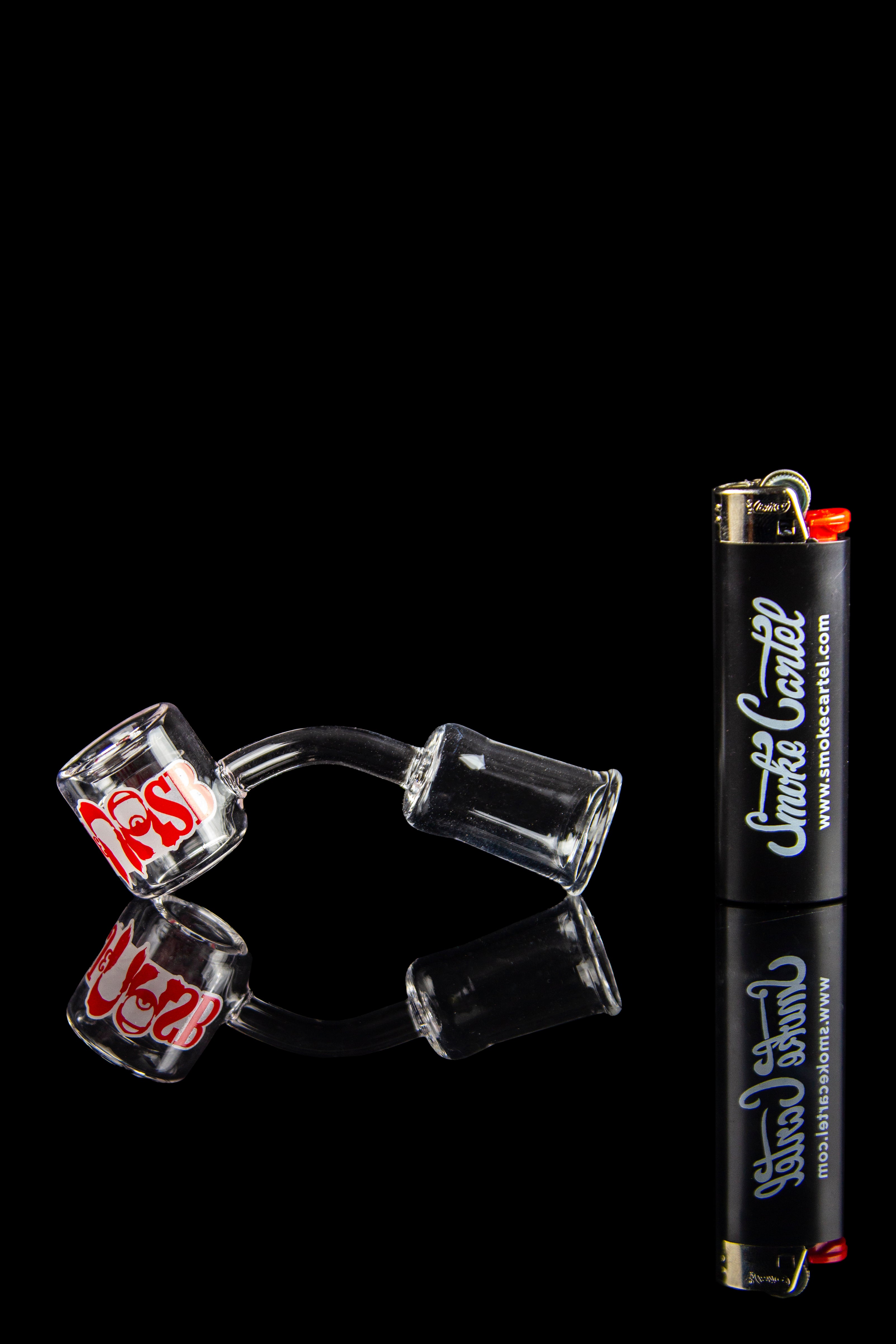 Glass cannabis concentrate containers and a lighter with branding for Smoke Cartel, set against a black background.
