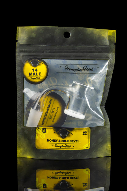 Silver mylar bag with black graphic of a shoe and branding for "Honeybee Herb" cannabis accessories.