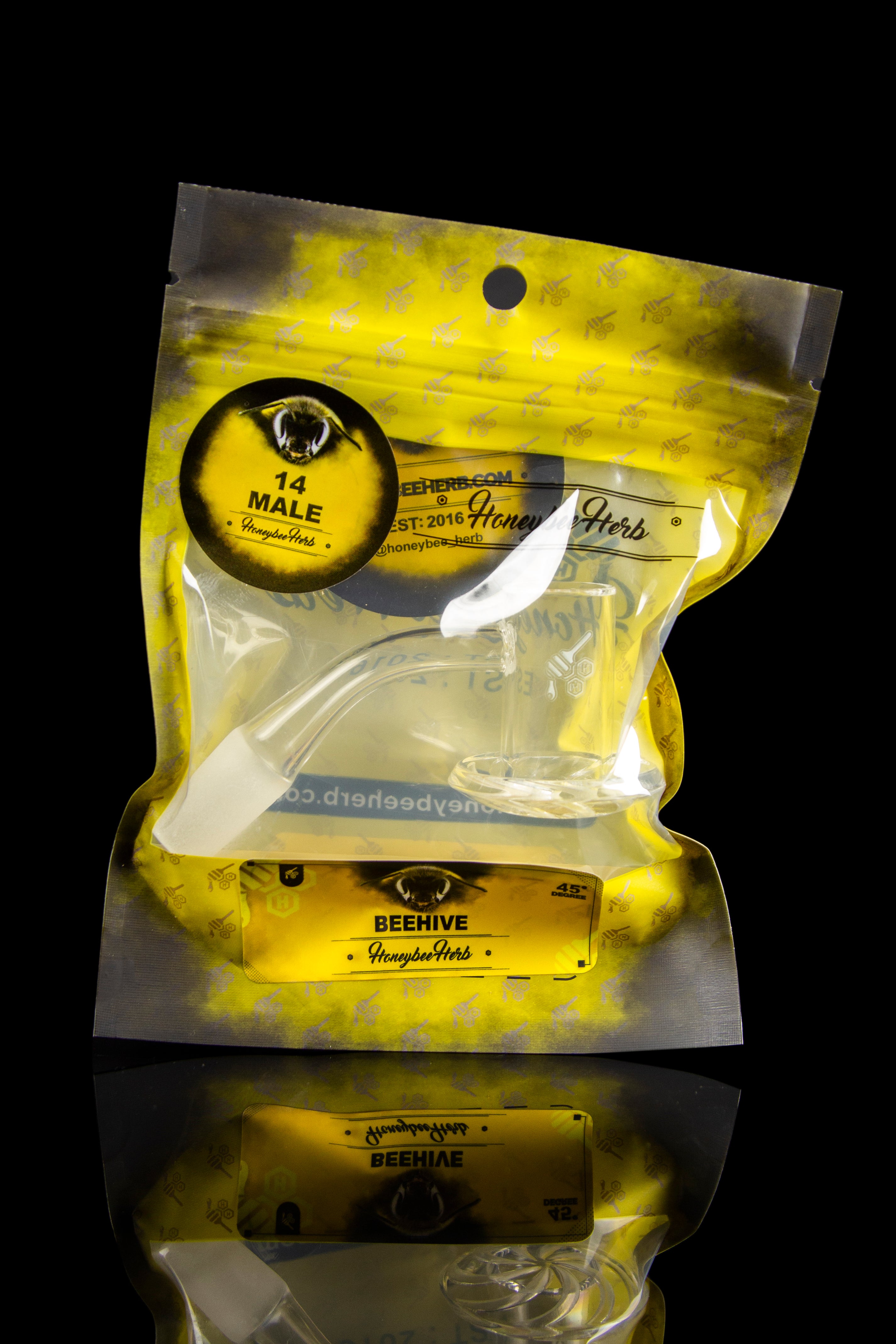 Clear plastic bag with “Beehive” and “Honeybee Herbs” branding, potentially containing cannabis.