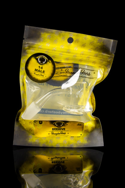 Clear plastic bag with “Beehive” and “Honeybee Herbs” branding, potentially containing cannabis.