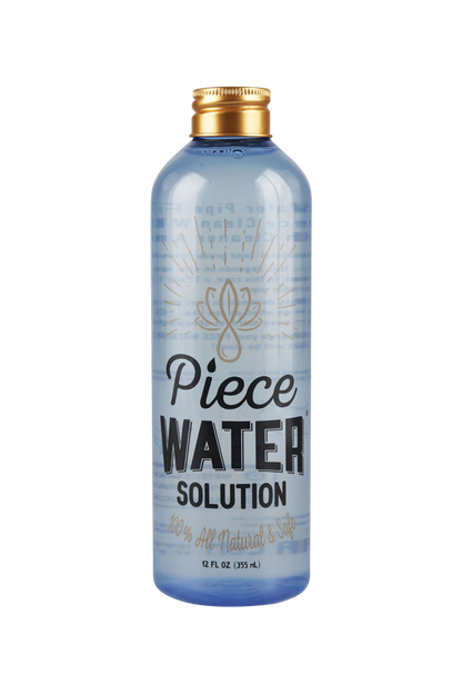 Front view of the Piece Water - Bong Water Replacement in a clear plastic bottle with a blue liquid inside.