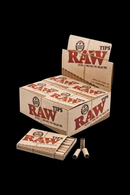 A close-up of a pack of RAW Pre-Rolled Tips, showing the folded, white paper tips against the branded packaging.