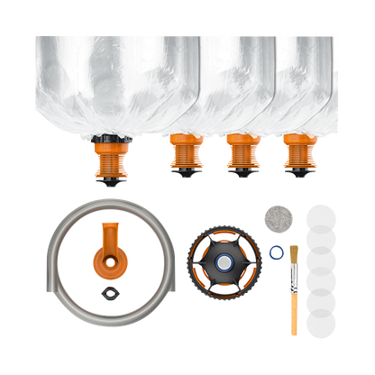 A top-down view of the Volcano Hybrid Starter Set components arranged against a white background, including various clear glass parts and connectors.