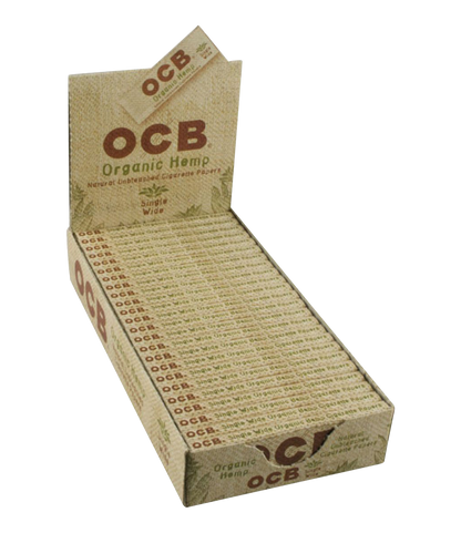A close-up, angled view of OCB Organic Hemp Rolling Papers - Single Wide, showcasing the green packaging and branding.