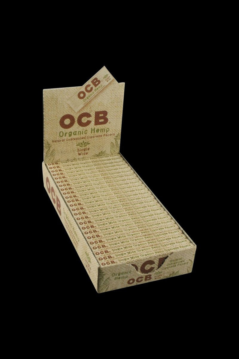 A close-up shot of OCB Organic Hemp Rolling Papers – Single Wide, displayed in a slim, dark-green packet with white lettering.