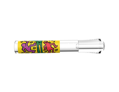 A centered, close-up view of the K.Haring Taster Chillum Pipe, displaying its colorful, patterned design against a white background.