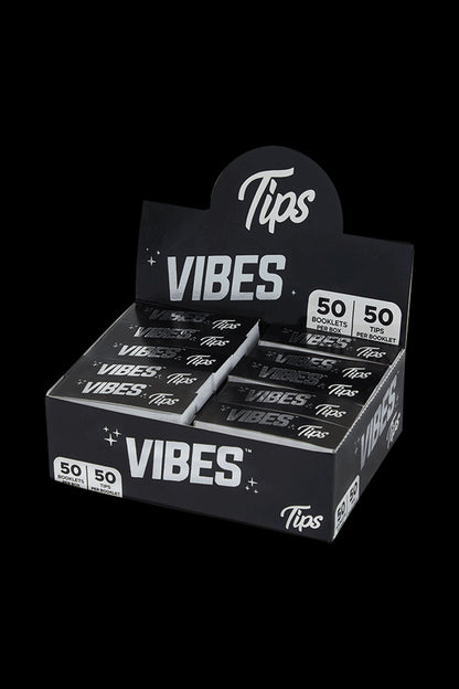 A close-up shot of the VIBES Rolling Tips Box - 50 Pack, displaying a stack of booklets with bold branding.