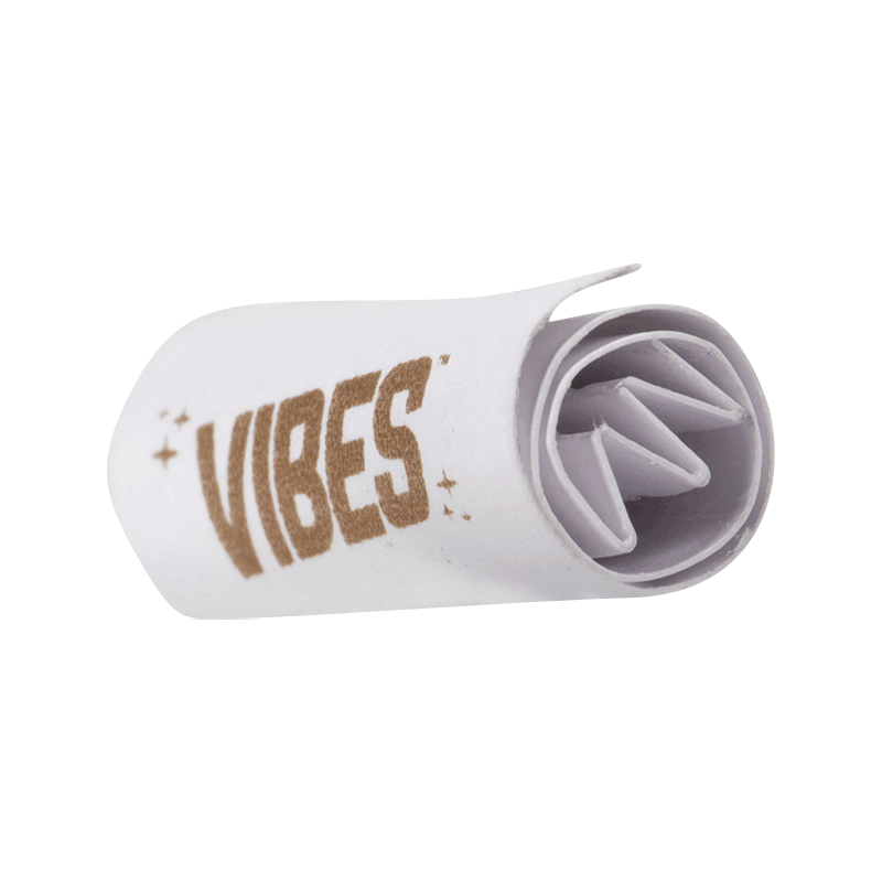 Close-up of the open VIBES Rolling Tips Box - 50 Pack, revealing a stack of white rolling tips inside.