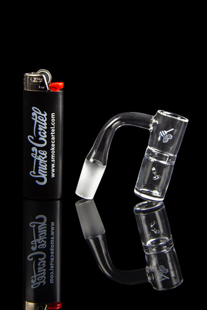 Glass dab rig with accessories and lighter, branded with "Smoke Cartel" logo on a black background.