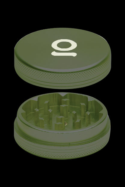 Olive green cannabis grinder, shown open and closed with a stylized "O" logo.