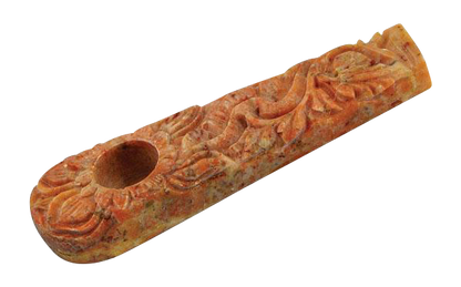 A close-up, angled view of the Marble Stone Pipe with Flower Design, showcasing its carved floral details.