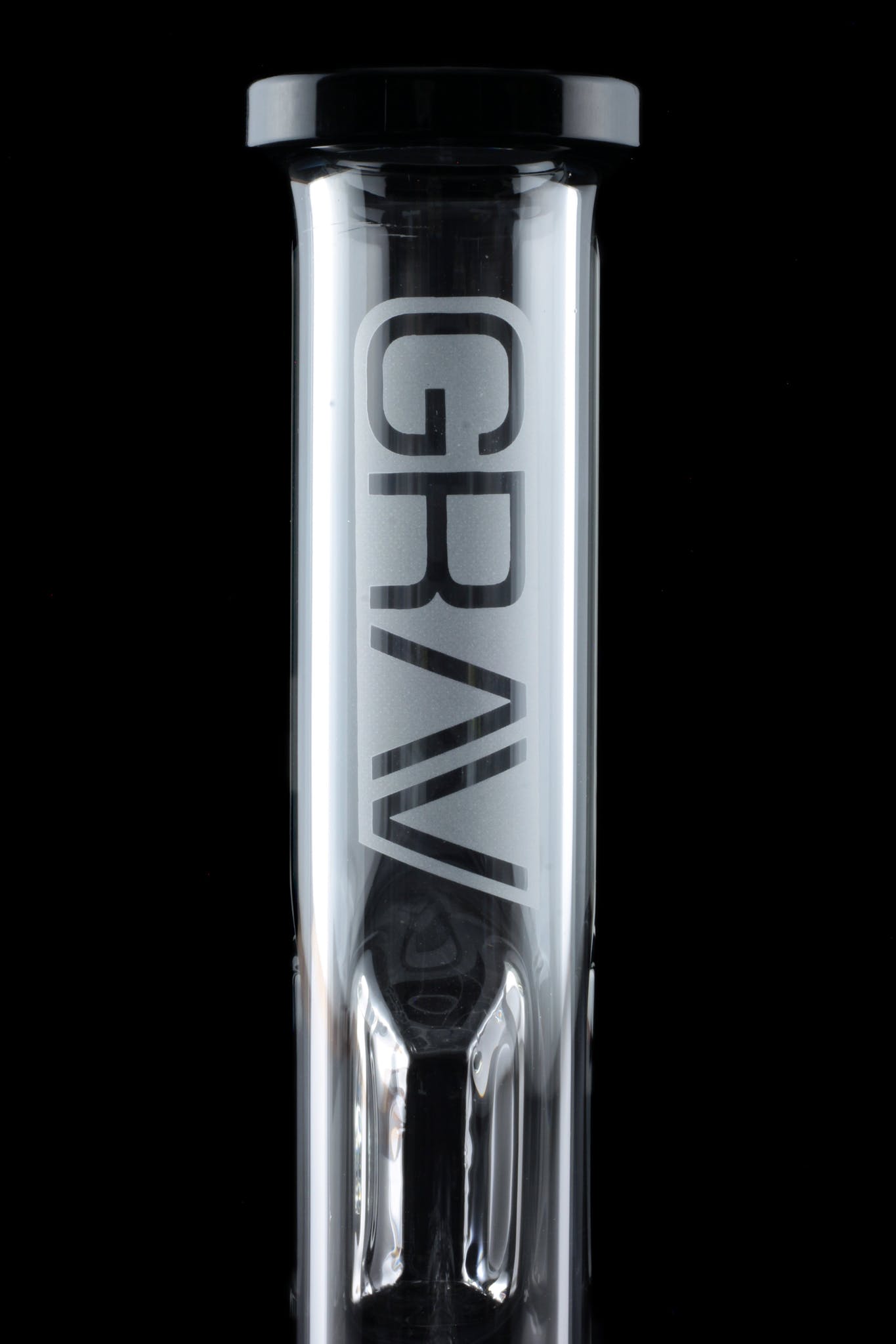 Clear glass water pipe with “GRAV” vertically printed along its length, against a black background.