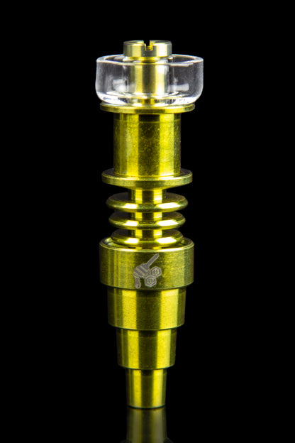 Gold-colored titanium e-nail with a quartz banger, isolated on a black background.