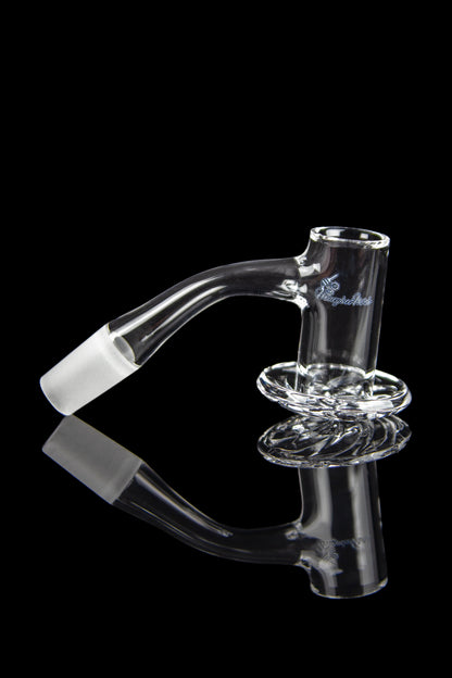 Clear glass cannabis oil rig with a curved neck and circular base, reflected on a black surface.