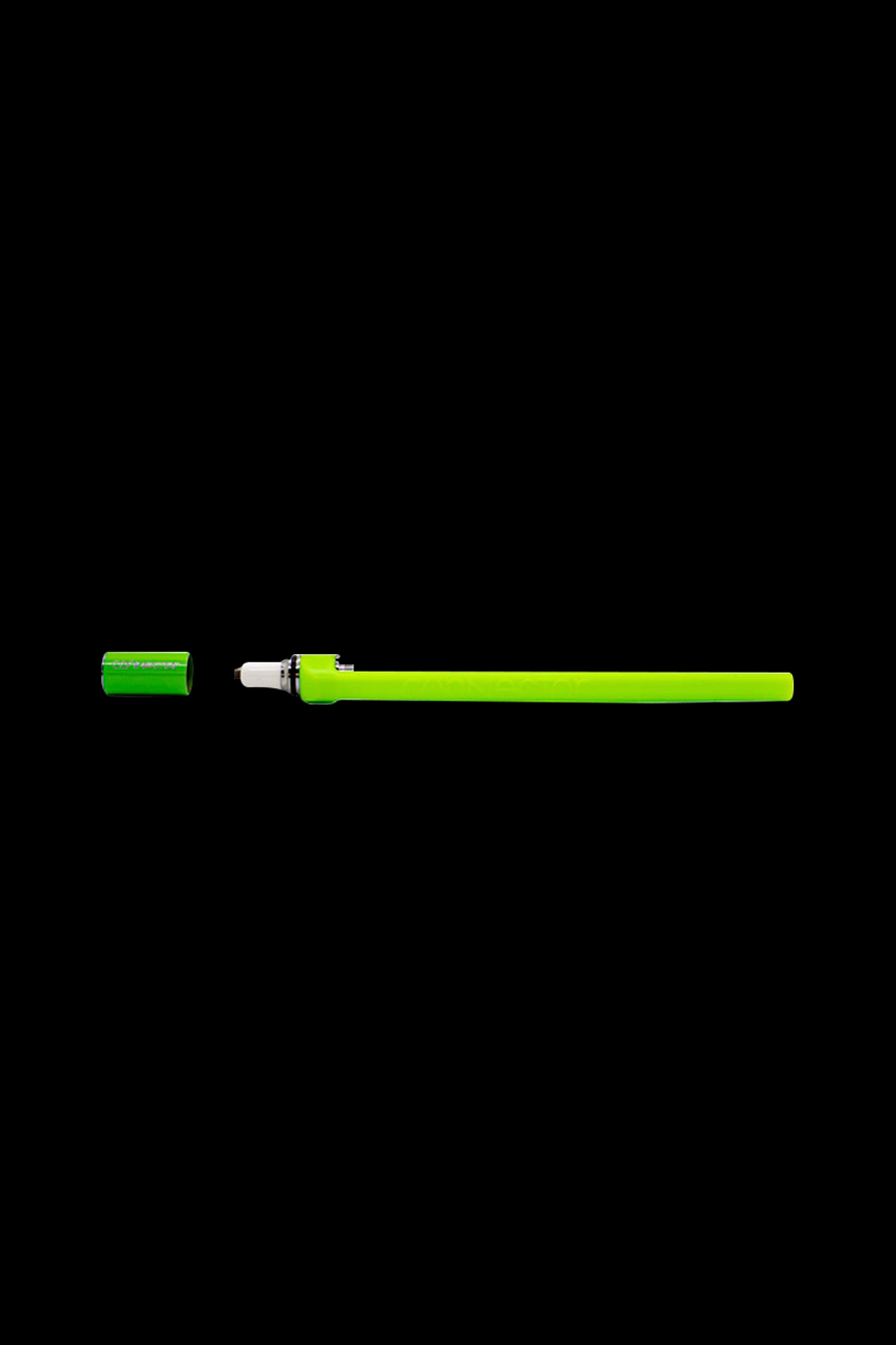 Green dab tool with a protective cap, isolated on a black background.