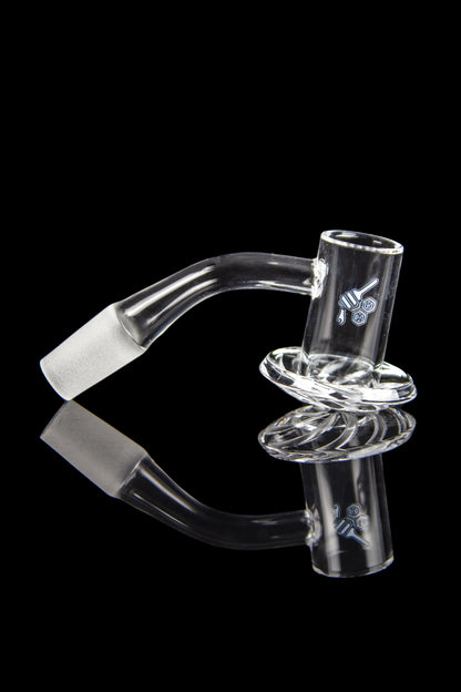 Clear glass bubbler with a bent neck and intricate design, reflected on a black surface.