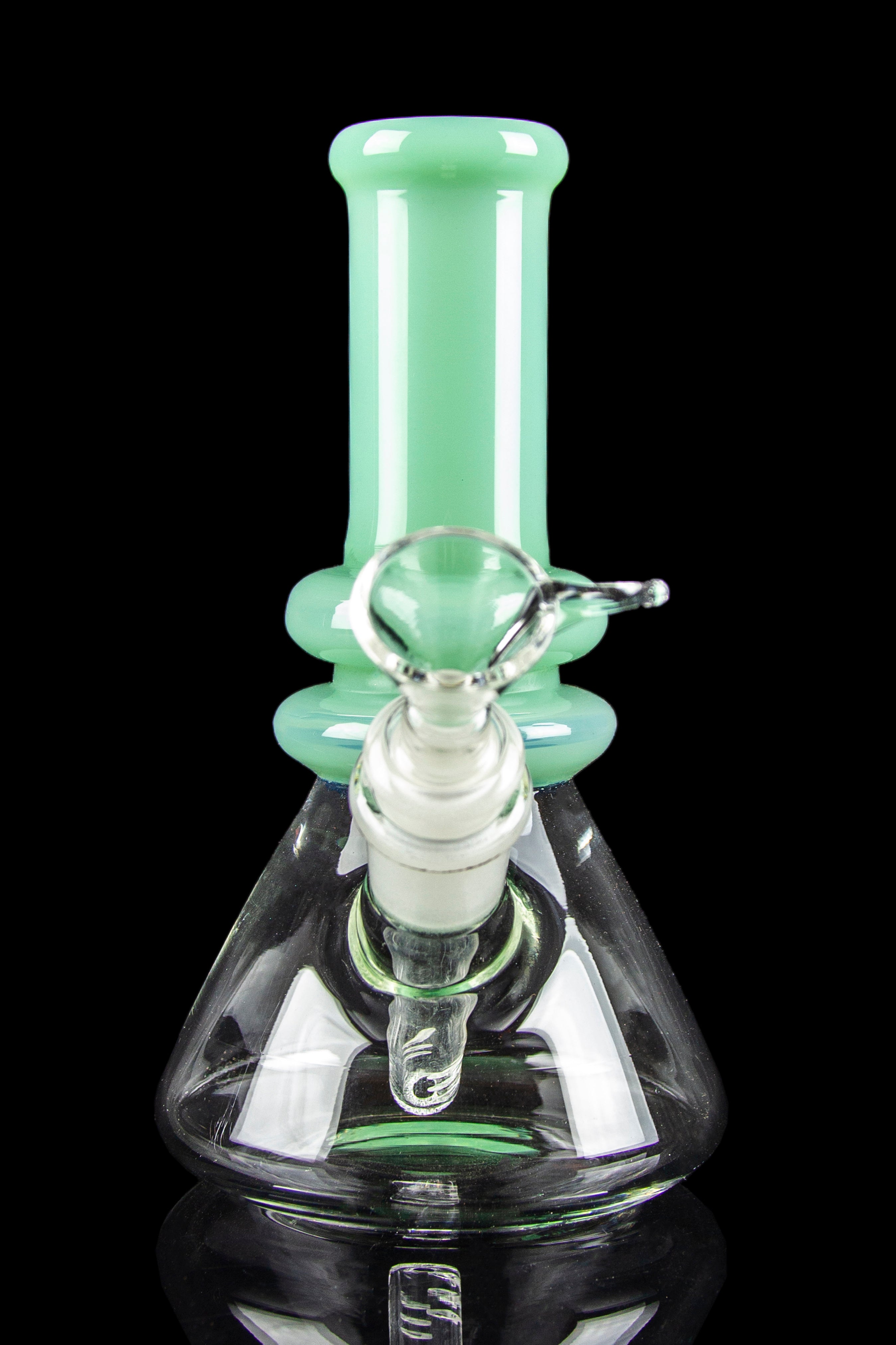 A green and clear glass bong with intricate bubble detailing and a wide base.
