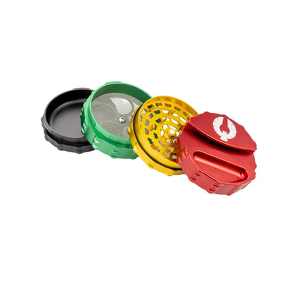 Disassembled multi-colored cannabis grinder with mesh screen and separate chambers.