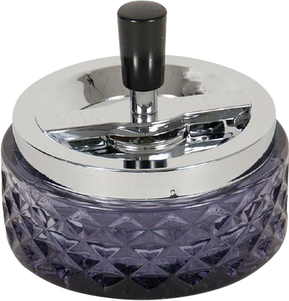 A close-up, angled view of the Glass Spinning Ashtray with a clear glass base and silver spinning cover.
