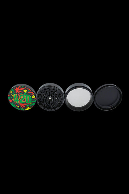 Cannabis grinder with four parts, featuring a 420 and leaf design on the lid, displayed on a black background.