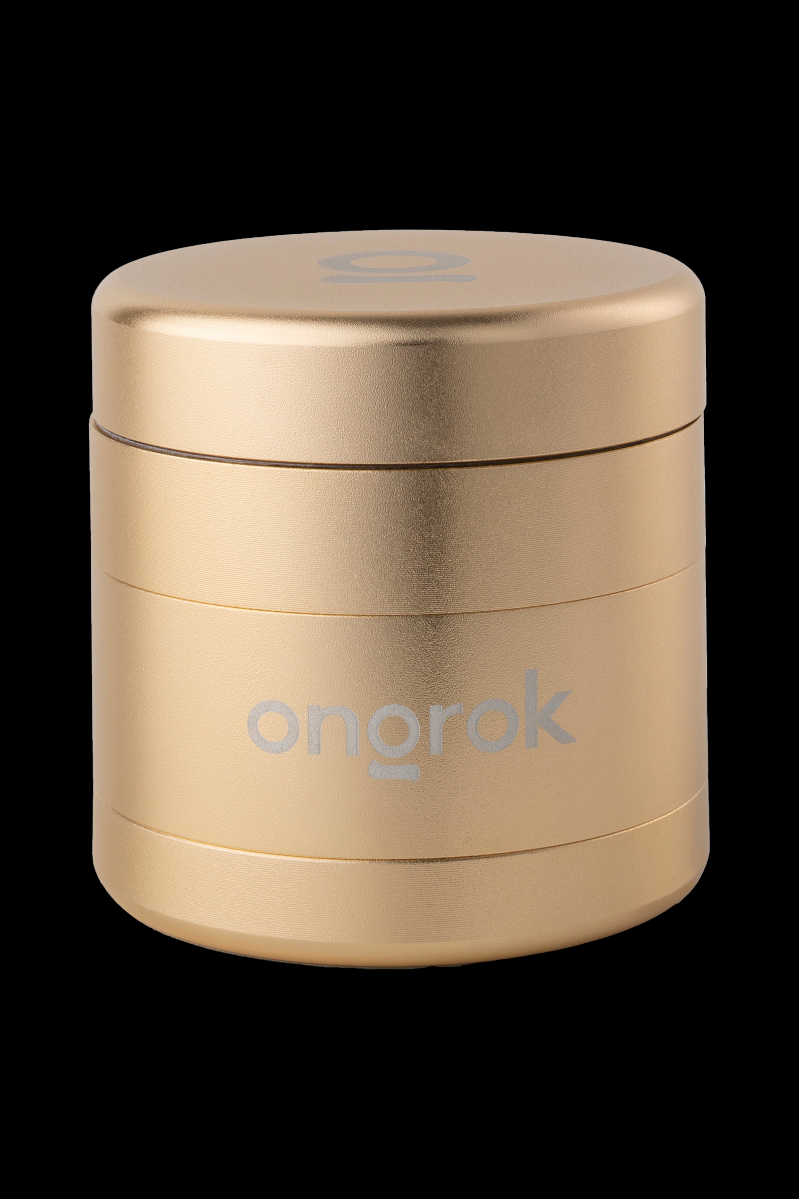 Gold cannabis grinder with "OnoroK" logo.