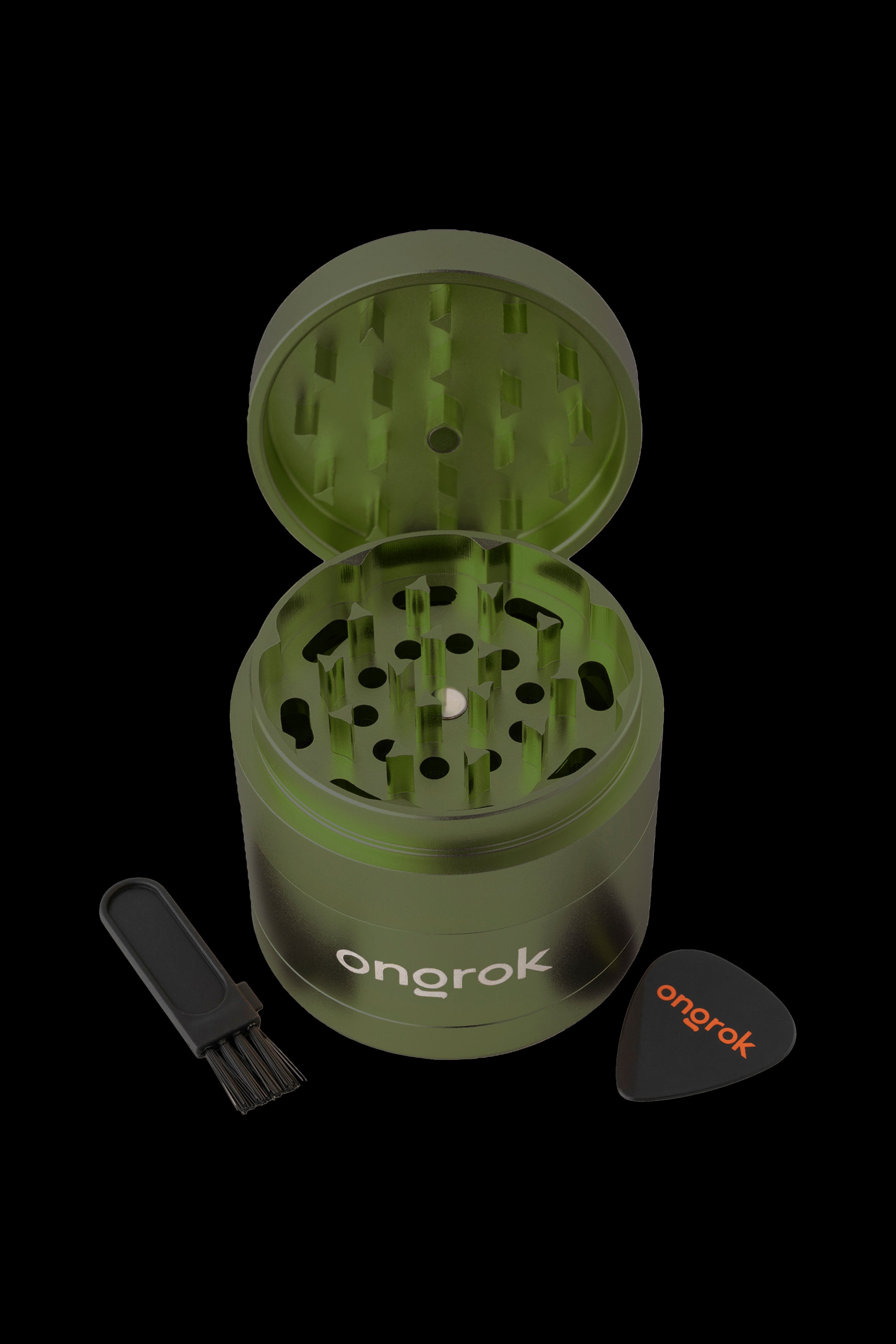 Green cannabis grinder with cleaning brush and scoop, branded “onrok”.